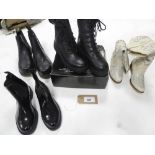 +VAT Pairs of boots in various styles and sizes to include Dr Martens (signs of wear), Combat Boots,