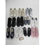 +VAT A bag containing 11 pairs of trainers in various styles and sizes to include pretty little