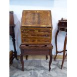 Miniature burr walnut bureau on stand