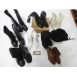 +VAT A bafg containing 8 pairs of boots in various styles and sizes