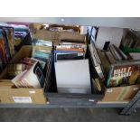 3 boxes of various books on themes of music, fishing, etc.