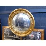 Circular gilt framed convex mirror