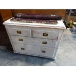 White painted chest of 2 over 2 drawers on castors