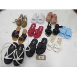 +VAT 10 Pairs of sandals and slippers in various styles and sizes to include M&S, Crocs, Ego, etc (