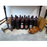 12 vintage Courage ale bottles, 3 with labels, ceramic hot water bottle, guillotine, shoe makers