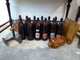 12 vintage Courage ale bottles, 3 with labels, ceramic hot water bottle, guillotine, shoe makers