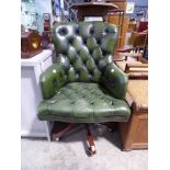 Green leather button back upholstered swivel office armchair