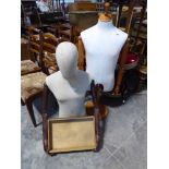 Posable mannequin with wooden jointed arms and fingers, together with a second similar mannequin