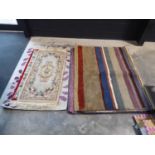 2 Chinese figured and bordered rugs and 1 modern rug
