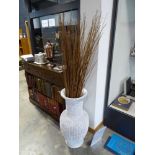 Large rattan vase with ornamental branches