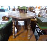 Carved octagonal topped dark oak occasional table