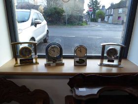 4 car themed mantle clocks: Jaguar, MG, Land Rover and Rover