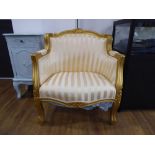 Modern gilt framed open armchairs with striped upholstery