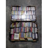 Two shallow trays of cassette tapes