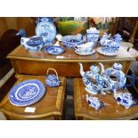 Large collection of blue and white pottery including 2 doughnut shaped teapot, duck shaped lidded