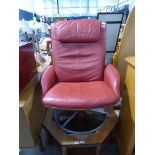 Red leatherette upholstered swivel office armchair