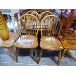 4 wheelback wooden dining chairs