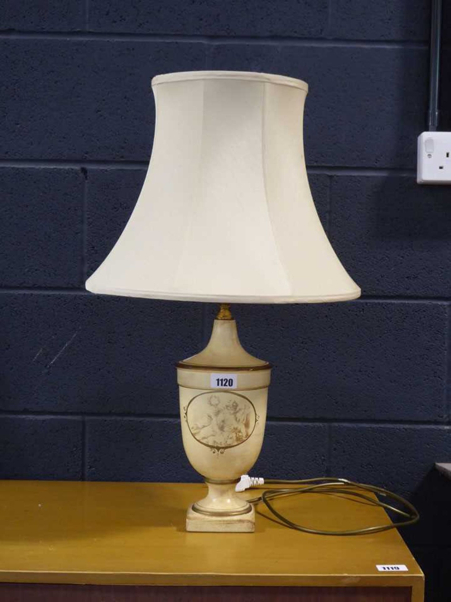 Table lamp, an urn shaped table lamp with cream shade