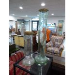 2 tubular glass vases with bulbous bases