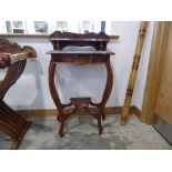 Burr walnut side table with brass trim