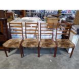4 mid century teak framed dining chairs with geometric upholstered seats