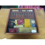 Wooden games case containing various different card and dice games