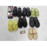 +VAT A bag containing 7 pairs of slides in various colours and sizes