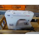 Singer 1507 sewing machine with soft cover