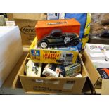Box containing various die cast vehicles