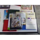 Cage of Jersey and Guernsey stamps - some contained within albums and 2 Asterix stamp albums