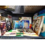 Cage containing a large qty of postcards, cigarette card albums and a set of vehicle themed