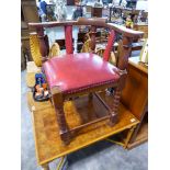 Wooden corner chair with red leather upholstered seat
