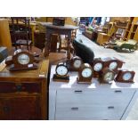 10 assorted clocks included a cuckoo clock, inlaid mantle clocks, etc