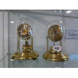 2 German brass dome clocks, 1 by Hettior