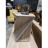 Modern geometric shaped small coffee table in a limed wood effect
