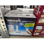 +VAT Two boxed Waterpik water flossers