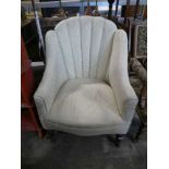Early 20th Century beige upholstered easy chair