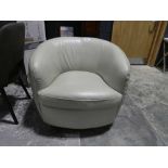 +VAT Beige leather upholstered revolving tub chair