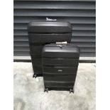 +VAT Pair of American Tourister suitcases in black