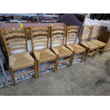 Set of 6 light oak rush seated ladder back dining chairs