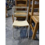 2 metal framed childs chairs