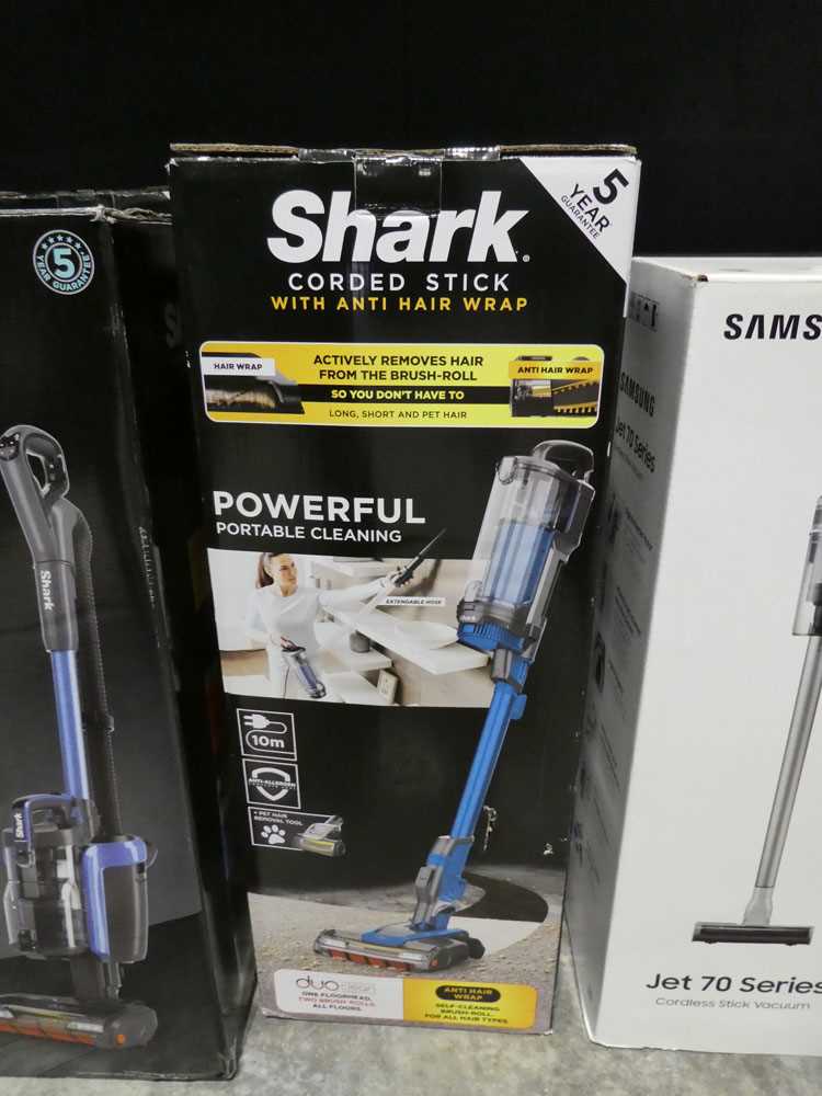 +VAT Shark corded stick vacuum cleaner in box