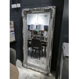 +VAT Large beveled gallery type mirror in decorative silver coloured frame