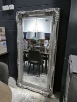+VAT Large beveled gallery type mirror in decorative silver coloured frame