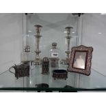 Shelf of various silver incl. picture frame, 2 bottles and cruet set plus pair of silver plated