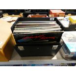 Record case containing a quantity of 45's and records including "The Specials", " The