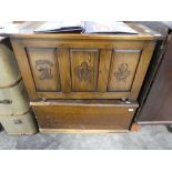 Dark oak coffee on castors and 1 further storage chest