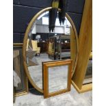 Gilt framed and bevelled oval wall mirror and one smaller walnut framed mirror