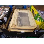 Crate containing various newspapers of local and historic interest