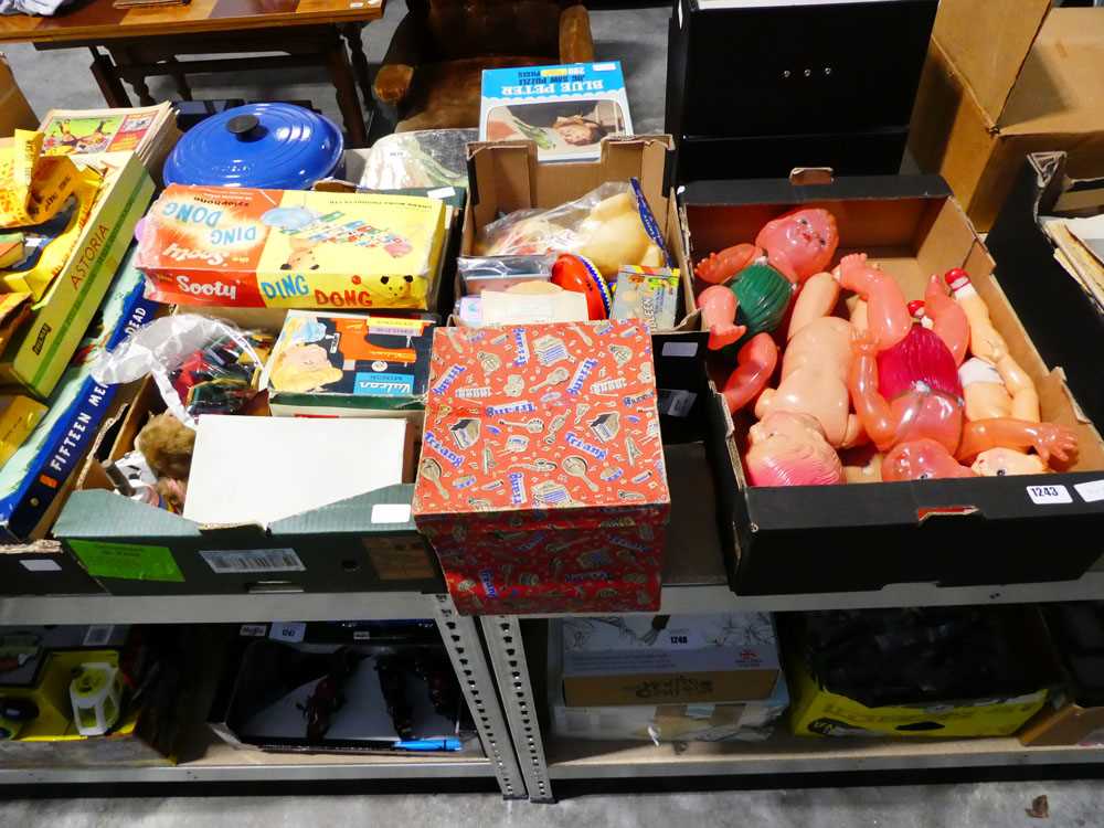 Approx. five crates of various vintage child's toys including a Tri-ang top, plastic dolls, puzzles,